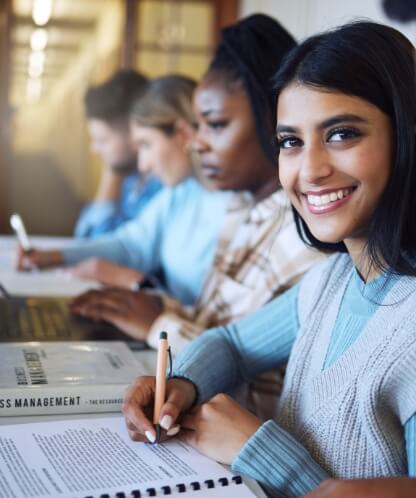 Group of students, one of them smiling